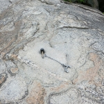 rock with hammer